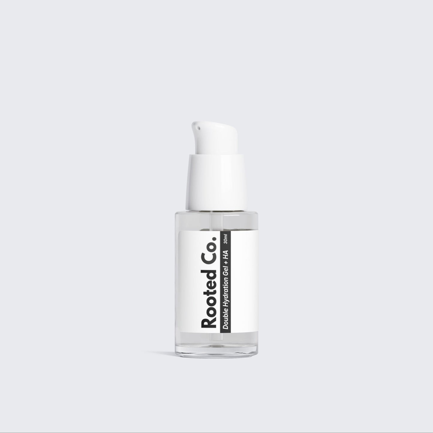 Skincare serum bottle with white label on a light gray background