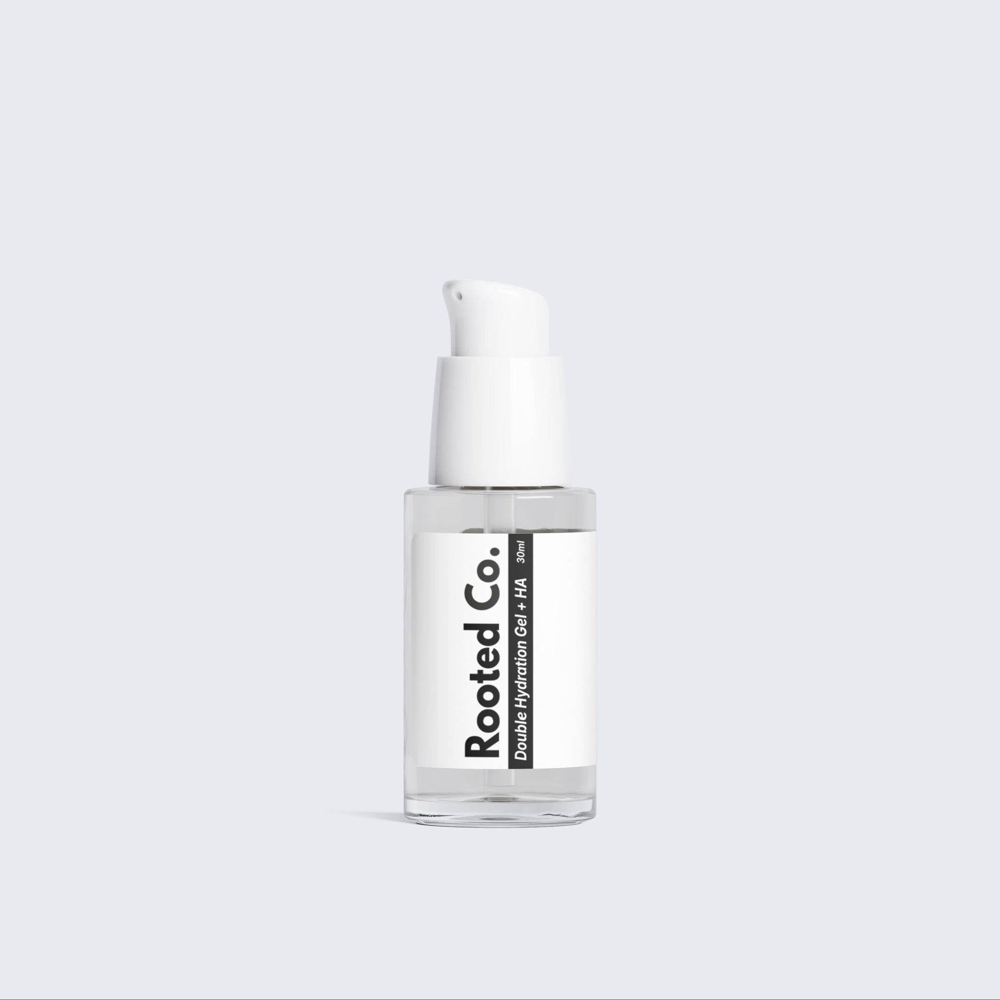 Skincare serum bottle with white label on a light gray background