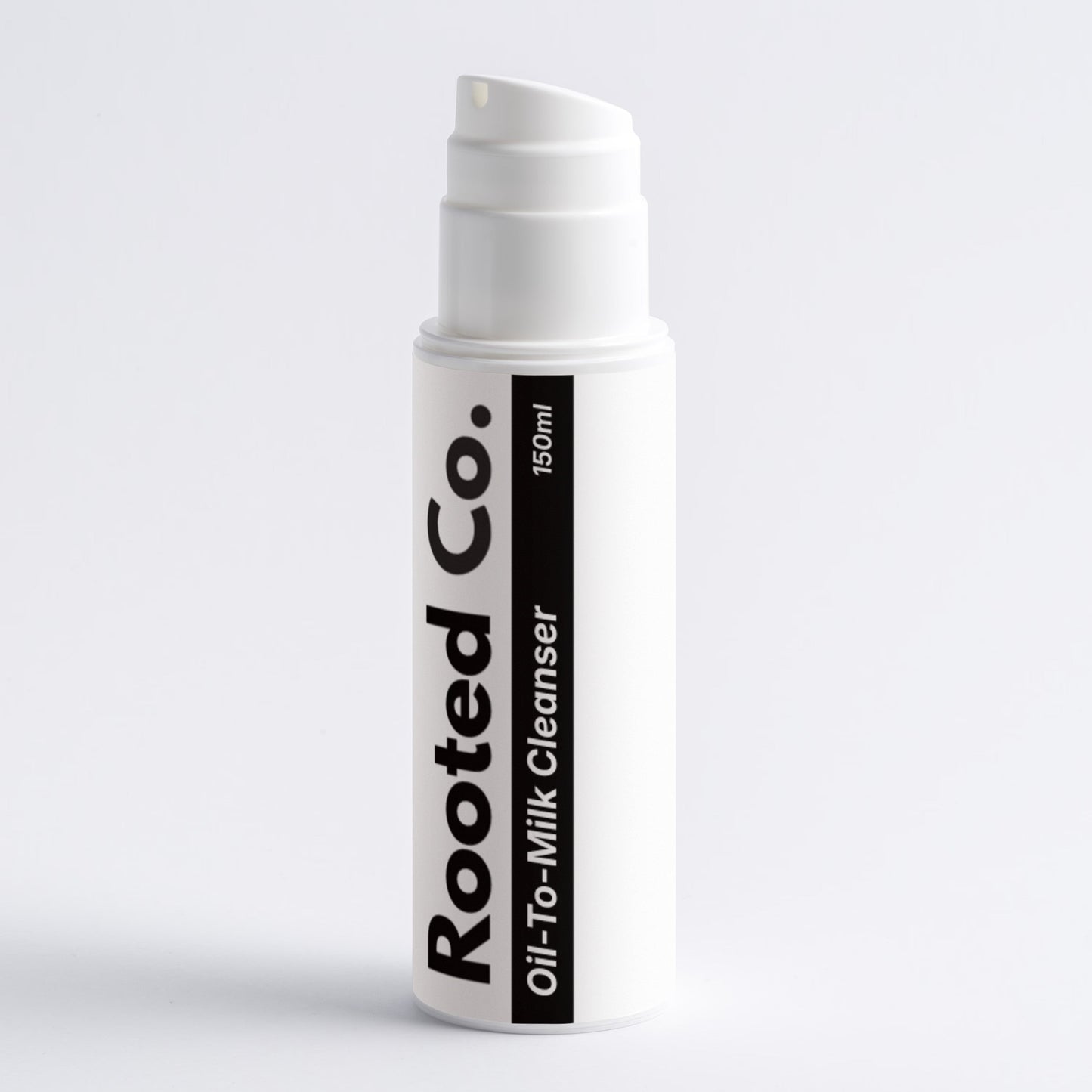 White skincare product bottle with 'Rooted Co.' branding on a light gray background