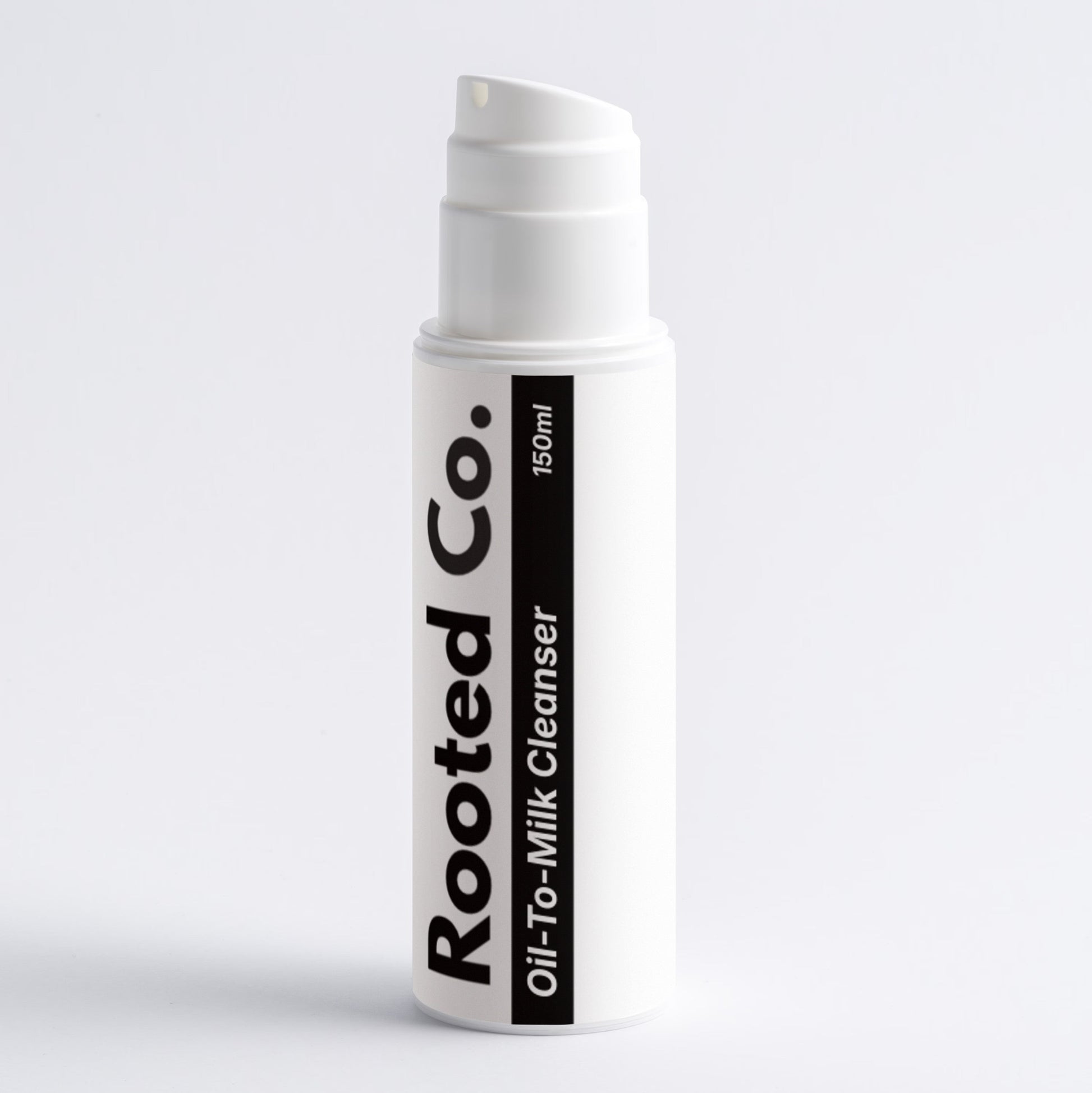 White skincare product bottle with 'Rooted Co.' branding on a light gray background